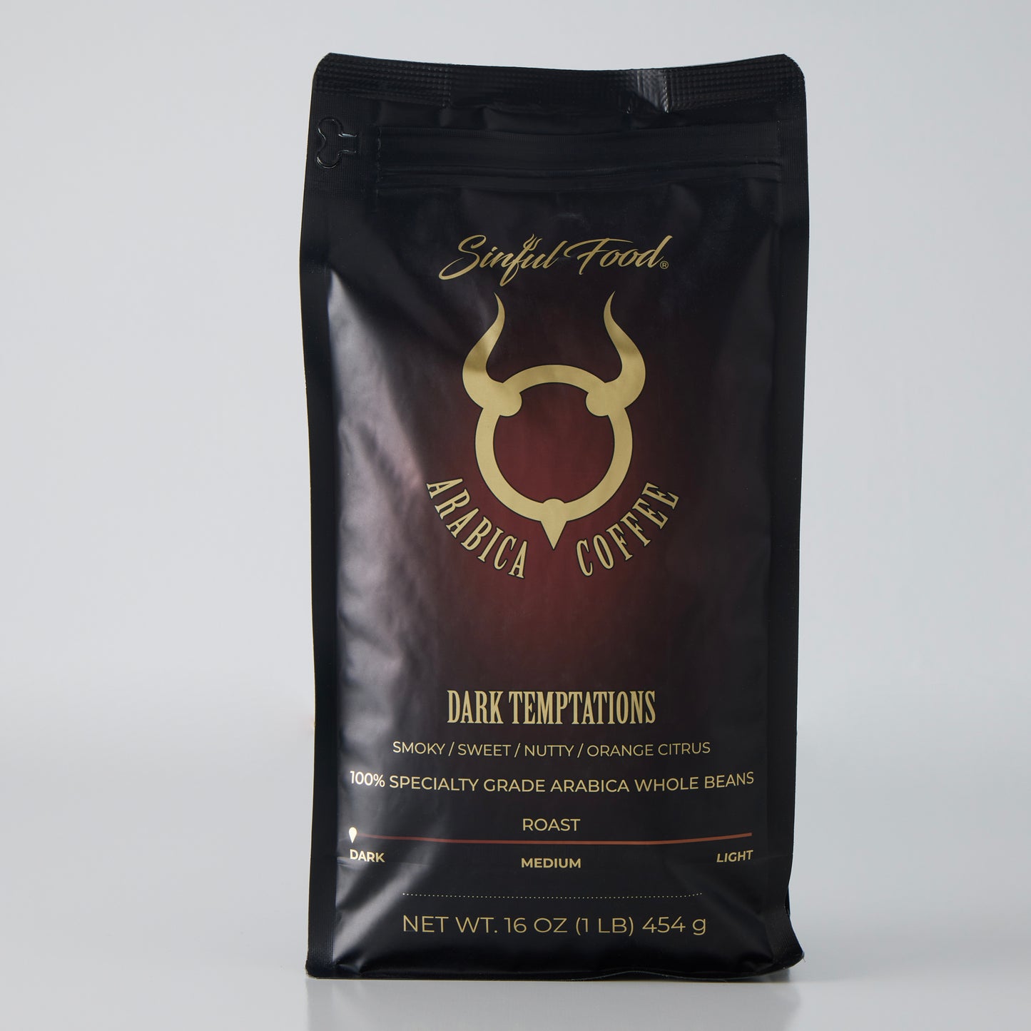 A bag of Sinful Food Dark Roast Coffee