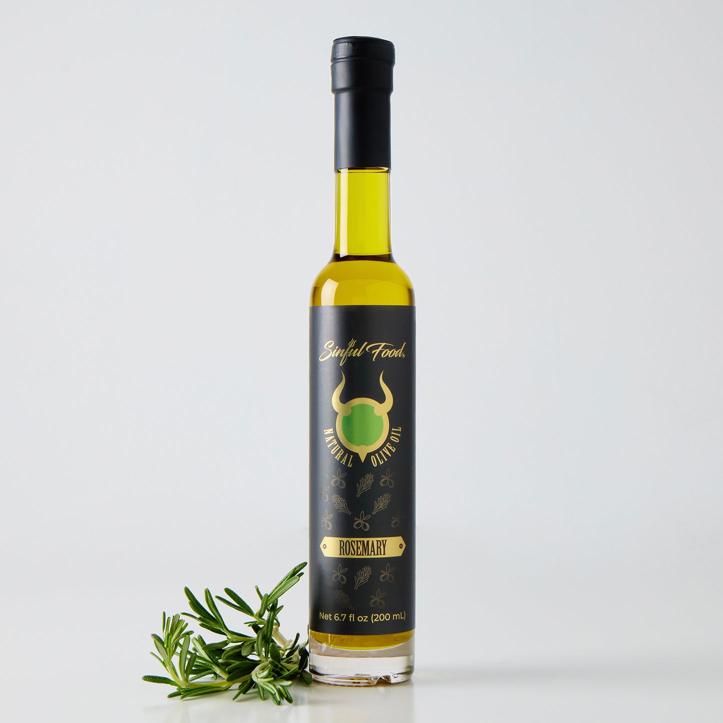 A bottle of Sinful ood Rosemary Olive Oil.