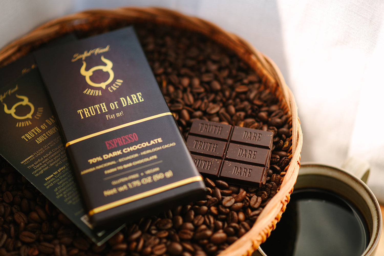 A basket with espresso roast coffee beans and chocolate.