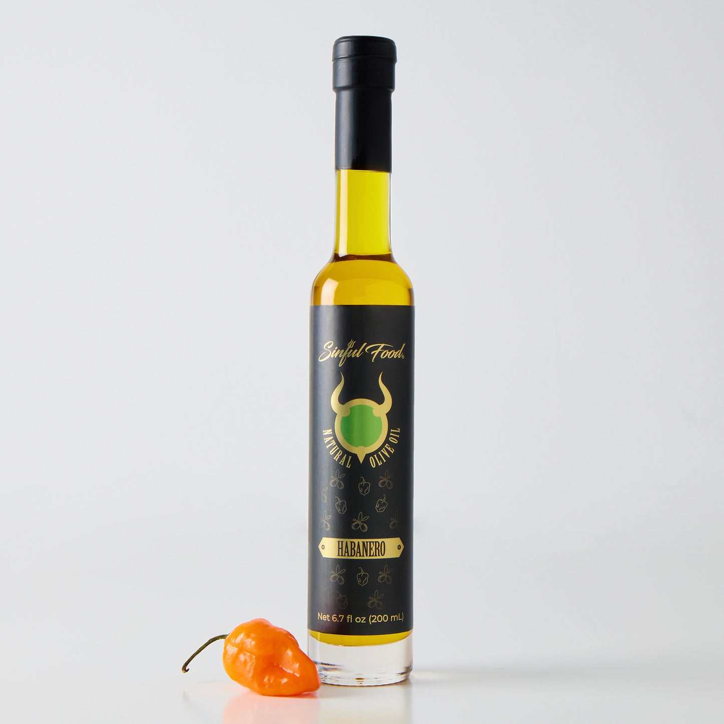 A bottle of Sinful Food Habanero Olive Oil.