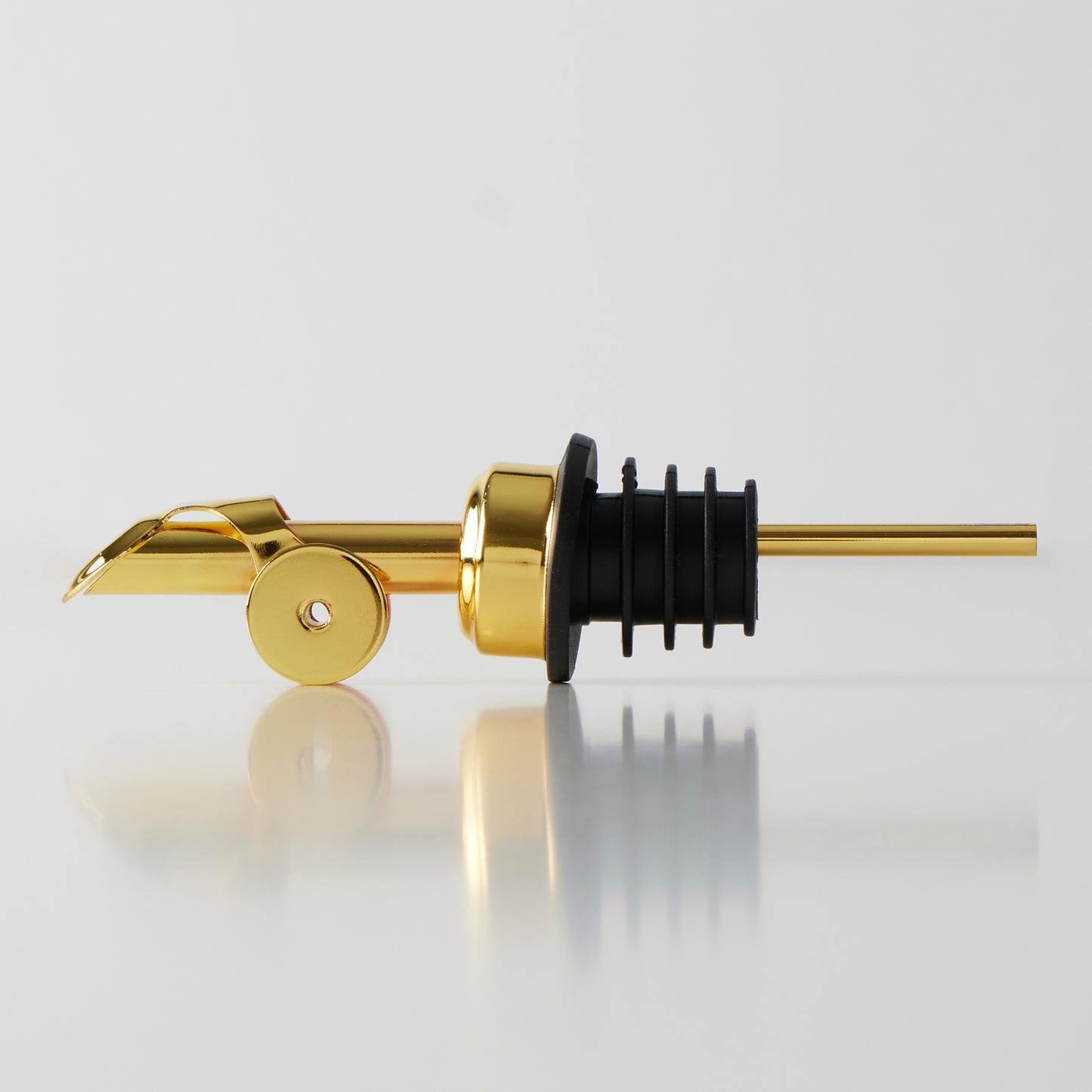 A Gold Olive Oil Dispenser.